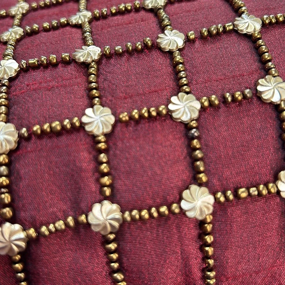 Pier 1 wine accent pillow with beaded details in gold.  Some beads missing. 16”.